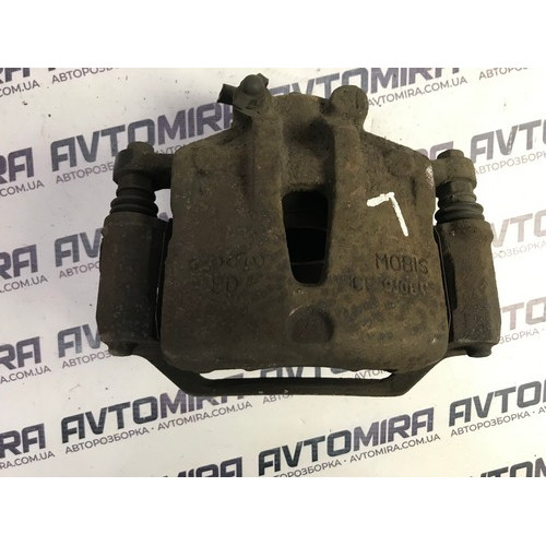 Суппорт тормозной передний левый Hyundai i30 2007-2012 581101H000